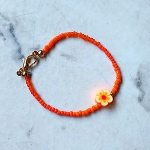 Orange flower bracelet